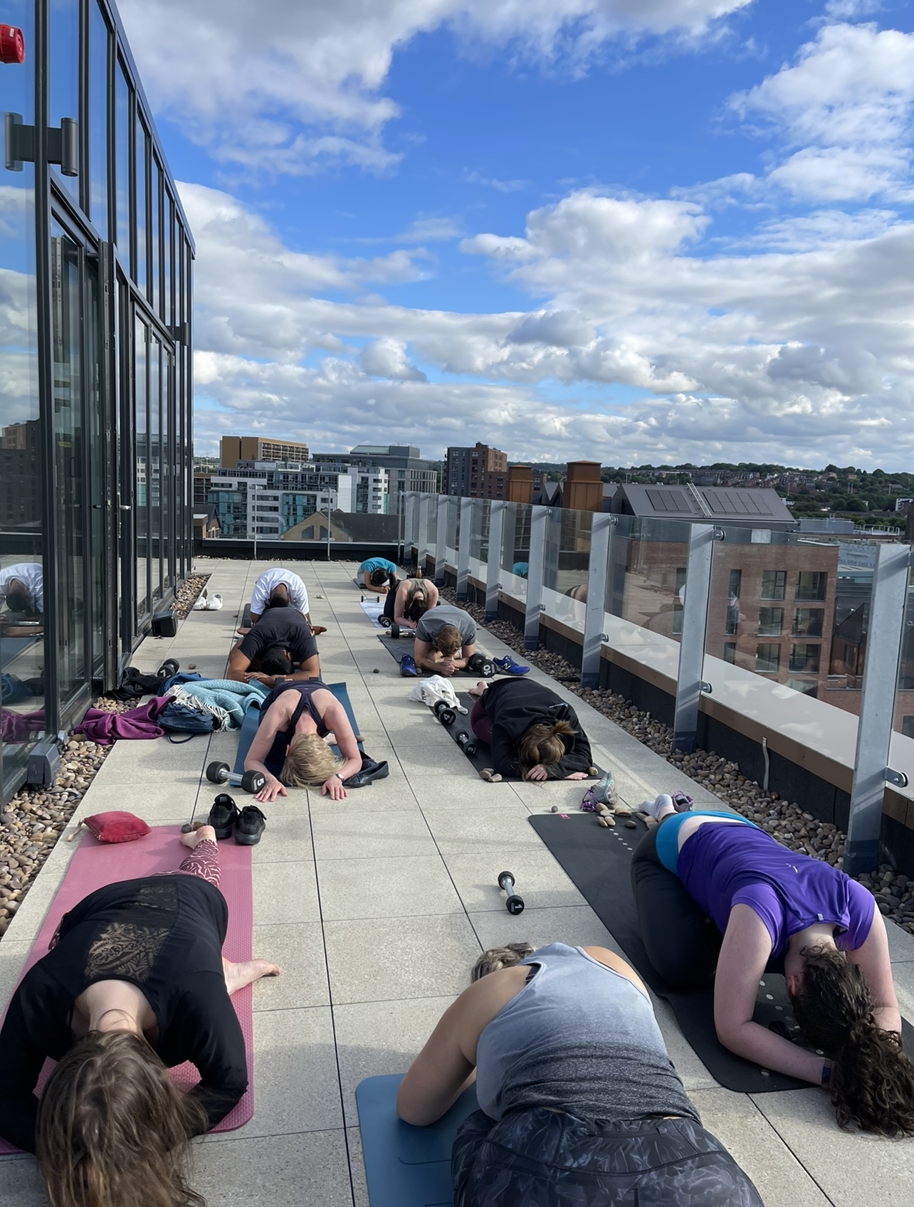 pigeon pose, Yoga by Nadine Hill corporate class, Leeds