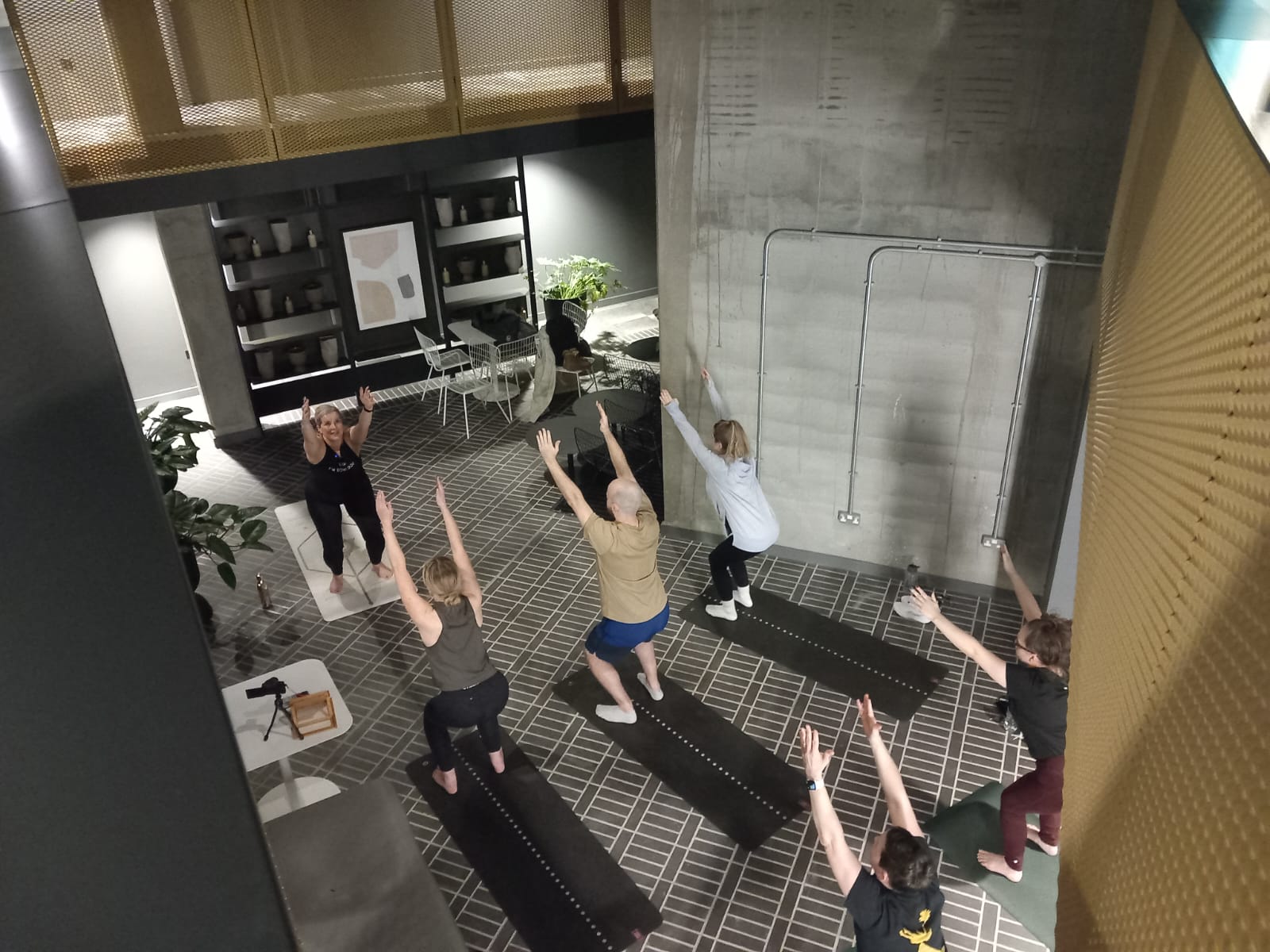 chair pose, Yoga by Nadine Hill corporate class, Leeds