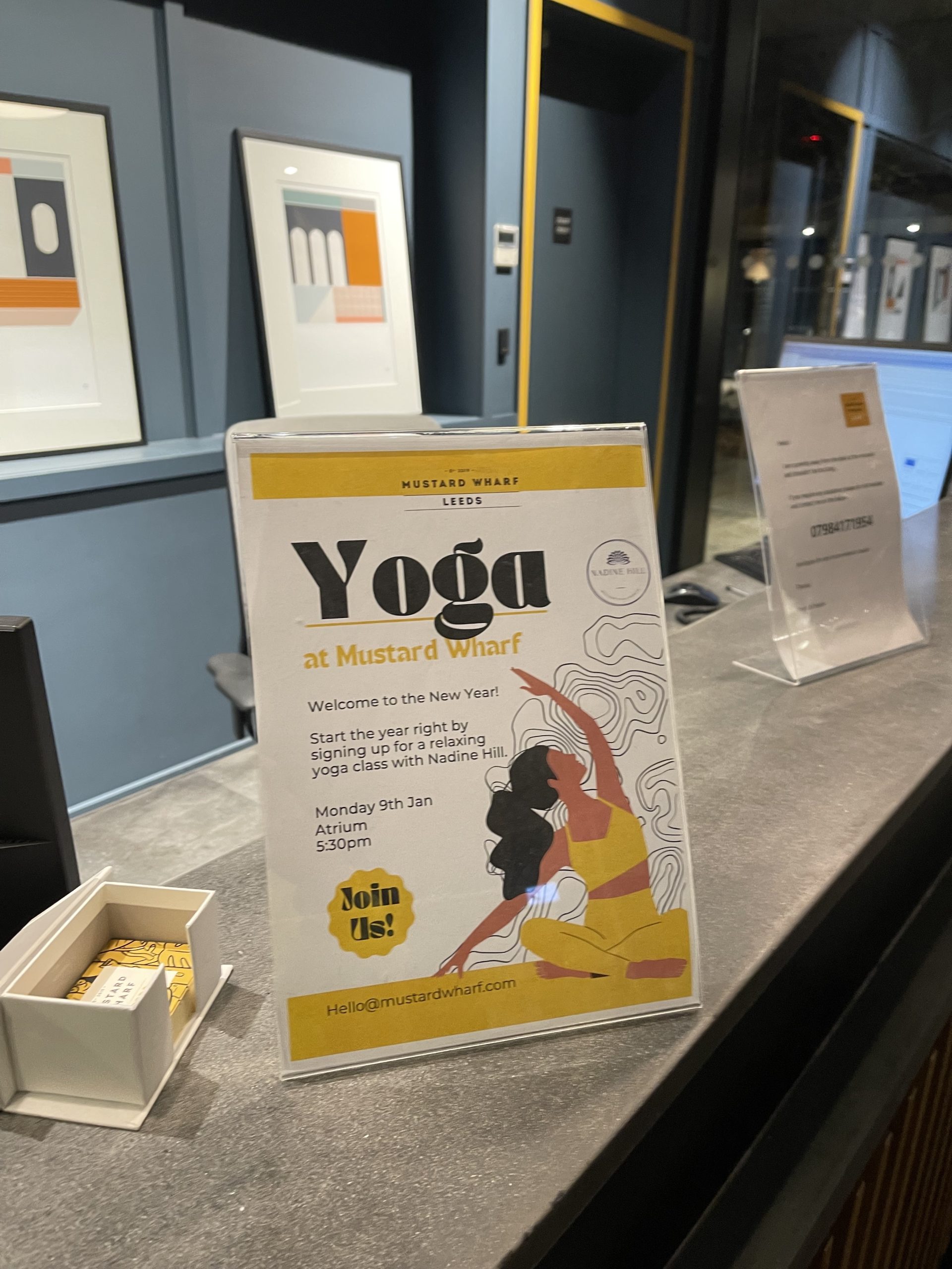 sign on reception, Yoga by Nadine Hill corporate class, Leeds
