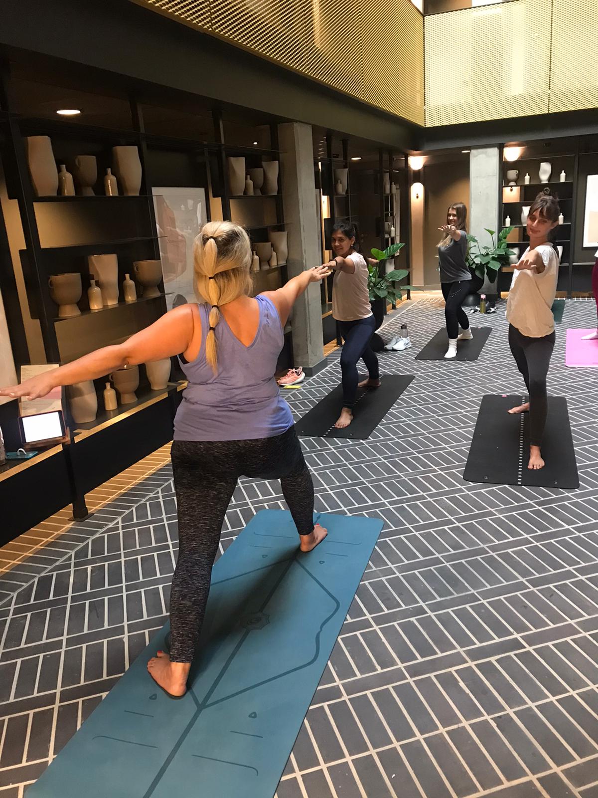warrior pose, Yoga by Nadine Hill corporate class, Leeds